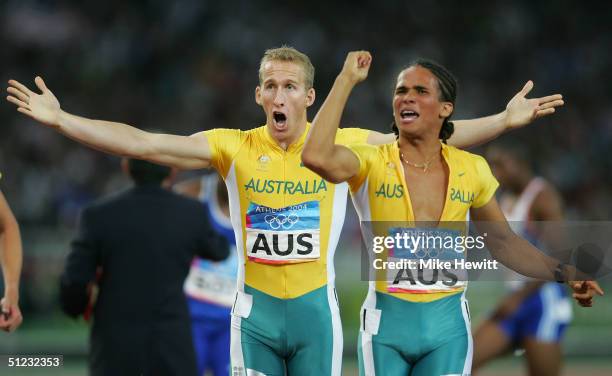 John Steffensen and Clinton Hill of the Australian relay team celebrate after they came second in the men's 4 x 400 metre relay final on August 28,...