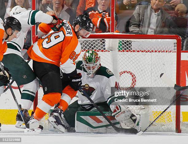 Sam Gagner of the Philadelphia Flyers scores at 18:45 of the first period against Devan Dubnyk of the Minnesota Wild at the Wells Fargo Center on...