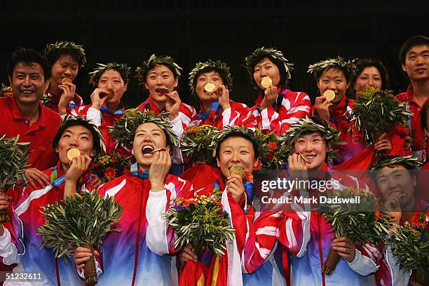 China celebrates after winning the gold medal in women's indoor volleyball during ceremonies on August 28, 2004 during the Athens 2004 Summer Olympic...