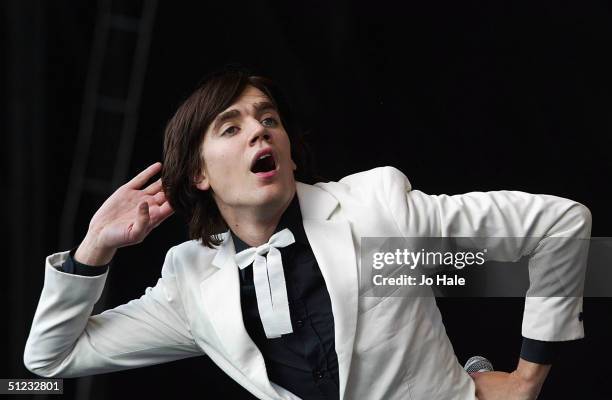 Pelle Almqvist of The Hives performs on stage on the first day of "The Carling Weekend: Reading Festival" on August 27, 2004 in Reading, England. The...