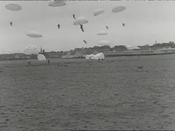 WW2 Propaganda photo of German parachutist jumping from plane WW2 Propaganda photo of German parachutist jumping from plane