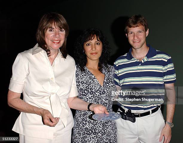 Guest Bobbie Silver, producer Greg Spotts' wife Mojgan Khalpari, and guest Keith Damsker attend the "American Jobs" premiere at the Laemmle Fairfax...