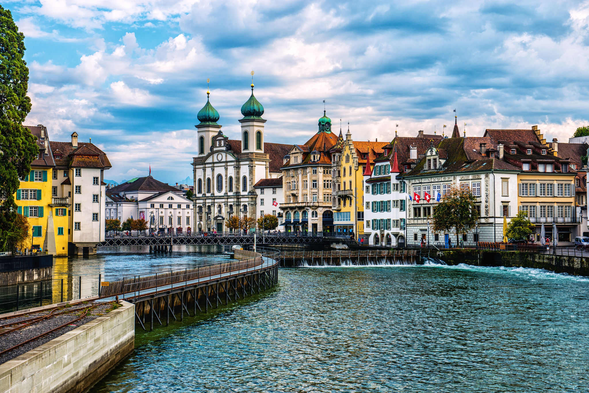 Jesuit Church and Reuss River in old town Lucerne, Switzerland Jesuit Church and Reuss River in old town Lucerne, Switzerland