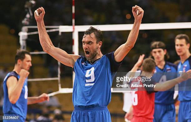 Vadim Khamuttskikh of Russia celebrates winning the men's indoor Volleyball bronze medal match on August 29, 2004 during the Athens 2004 Summer...