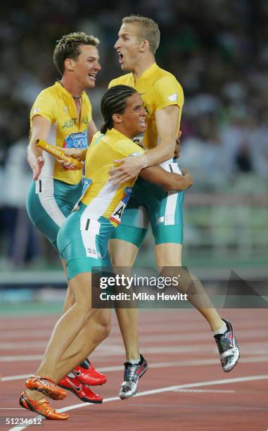 Mark Ormrod, John Steffensen and Clinton Hill of Australia celebrate their silver medal in the men's 4 x 400 metre relay final on August 28, 2004...