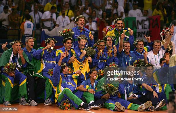 Team Brazil pose for photos after receiving the gold medal for men's indoor Volleyball during ceremonies on August 29, 2004 during the Athens 2004...