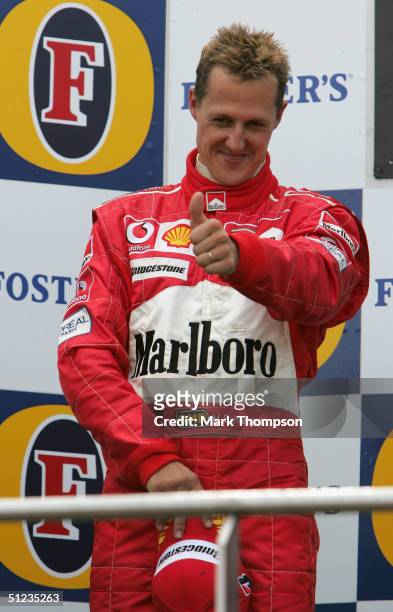 Michael Schumacher of Germany and Ferrari celebrates winning the Driver's Championship after he finished second in the Belgium F1 Grand Prix at the...