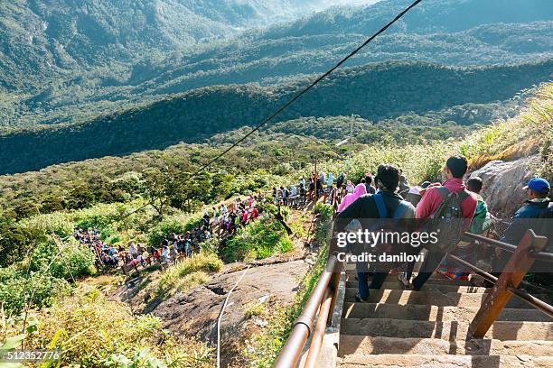 people descending the adam's peak, sri lanka - adams peak stock pictures, royalty-free photos & images