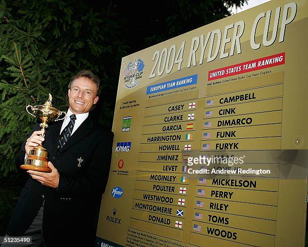 Bernhard Langer of Germany poses with the trophy after announcing the European team at the Ryder Cup Press Conference at the BMW International Open...