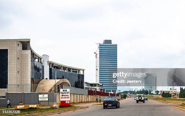 african city. abuja, nigeria. - abuja stock pictures, royalty-free photos & images