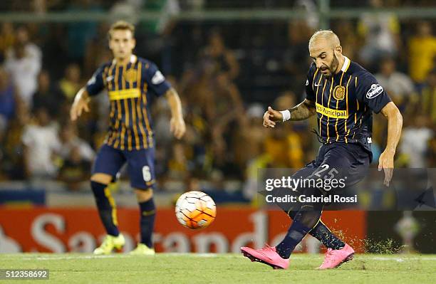 Javier Pinola of Rosario Central kicks the ball during a group stage match between Rosario Central and Nacional as part of Copa Bridgestone...