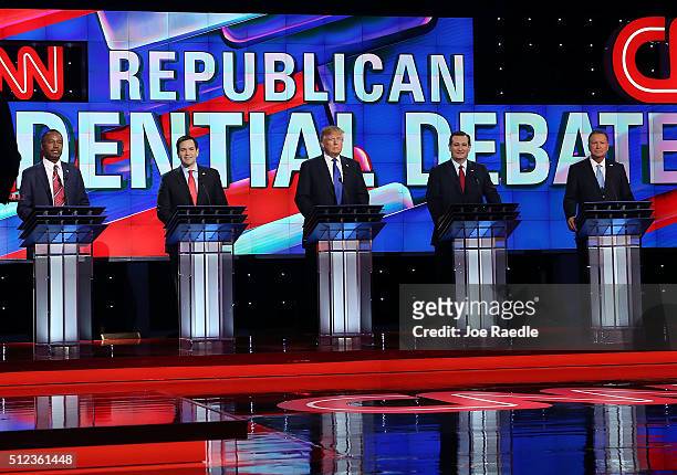 Republican presidential candidates Ben Carson, Florida Sen. Marco Rubio , Donald Trump, Texas Sen. Ted Cruz and Ohio Gov. John Kasich stand on stage...