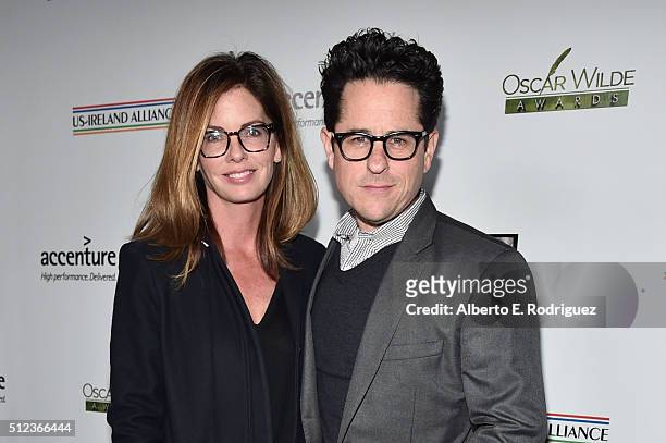Director J.J. Abrams and his wife Katie McGrath attend the Oscar Wilde Awards at Bad Robot on February 25, 2016 in Santa Monica, California.