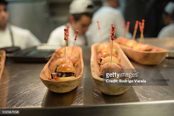 Food being served at a Dinner Hosted By Francis Mallmann And Paul Qui during 2016 Food Network & Cooking Channel South Beach Wine & Food Festival...
