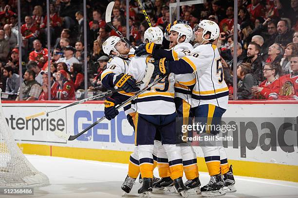 James Neal, Calle Jarnkrok, Mike Fisher and Roman Josi of the Nashville Predators celebrate after Jarnkrok scored in the third period of the NHL game...