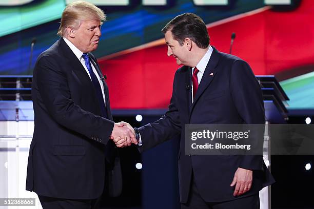 Donald Trump, president and chief executive of Trump Organization Inc. And 2016 Republican presidential candidate, left, shakes hands with Senator...