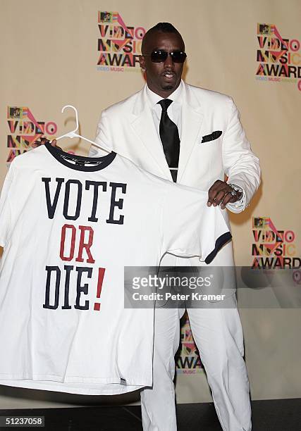 Rapper Sean "P. Diddy" Combs poses in the press room at the 2004 MTV Video Music Awards on August 29, 2004 at the American Airlines Arena, in Miami,...