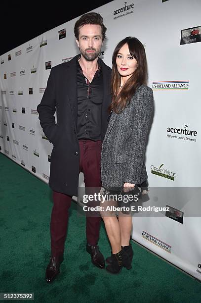 Actors Emmett Scanlan and Claire Cooper attend the Oscar Wilde Awards at Bad Robot on February 25, 2016 in Santa Monica, California.