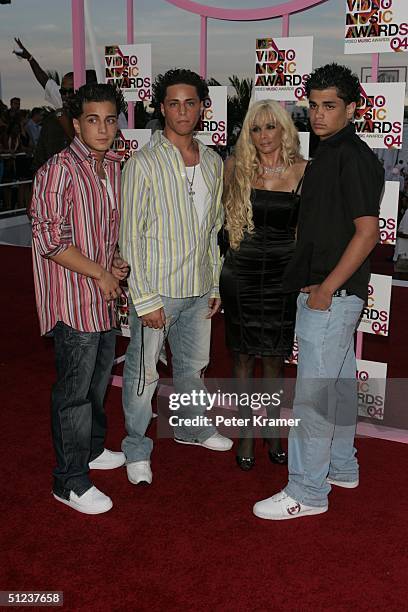 Victoria Gotti and her family arrives at the 2004 MTV Video Music Awards at the American Airlines Arena August 29, 2004 in Miami, Florida.