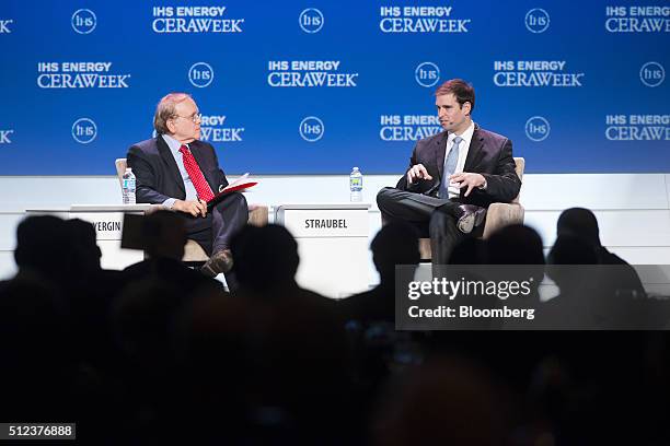 Jeffrey Straubel, chief technical officer of Tesla Motors Inc., right, speaks as Daniel Yergin, vice chairman of IHS Cambridge Energy Research...