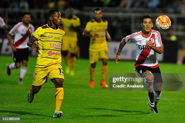 Sebastian Driussi of River Plate struggles for the ball with Manuel Granados of Trujillanos during a group stage match between Trujillanos and River...