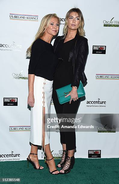 Actress Alison Doody and her daughter arrive at the 2016 Oscar Wilde Awards at Bad Robot on February 25, 2016 in Santa Monica, California.