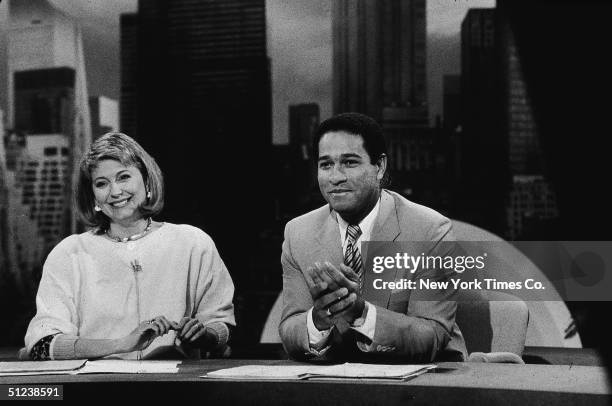 American television personalities Jane Pauley and Bryant Gumbel sit at their desk as they host the NBC morning news program 'Today' in New York, May...