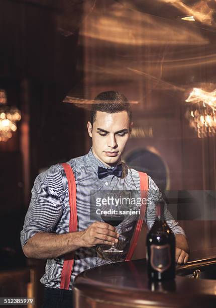young man drinking at the nightclub - speakeasy stock pictures, royalty-free photos & images