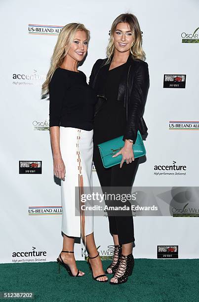 Actress Alison Doody and her daughter arrive at the 2016 Oscar Wilde Awards at Bad Robot on February 25, 2016 in Santa Monica, California.