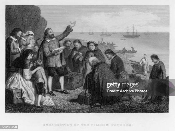 September 1620, The 'Embarkation of the Pilgrim Fathers' depicts men, women and children kneeling to pray before a man reading from a book by the...