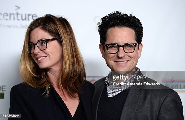 Director J.J. Abrams and his wife Katie McGrath arrive at the 2016 Oscar Wilde Awards at Bad Robot on February 25, 2016 in Santa Monica, California.