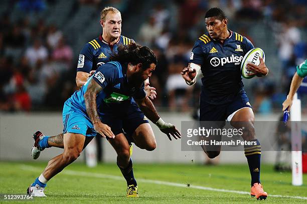 Waisake Naholo of the Highlanders makes a break during the round one Super Rugby match between the Blues and the Highlanders at Eden Park on February...