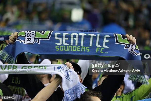 Fans of the Seattle Sounders hold up scarfs during the CONCACAF Champions League match between Seattle Sounders and Club America at CenturyLink Field...