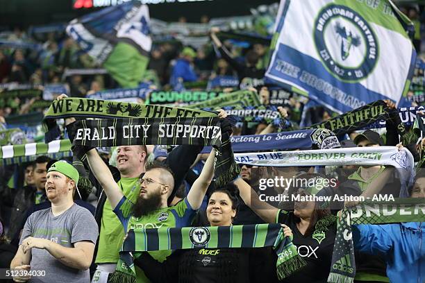 Fans of the Seattle Sounders hold up scarfs during the CONCACAF Champions League match between Seattle Sounders and Club America at CenturyLink Field...