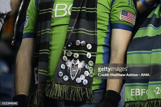 Fan of the Seattle Sounders with badges on his scarf during the CONCACAF Champions League match between Seattle Sounders and Club America at...