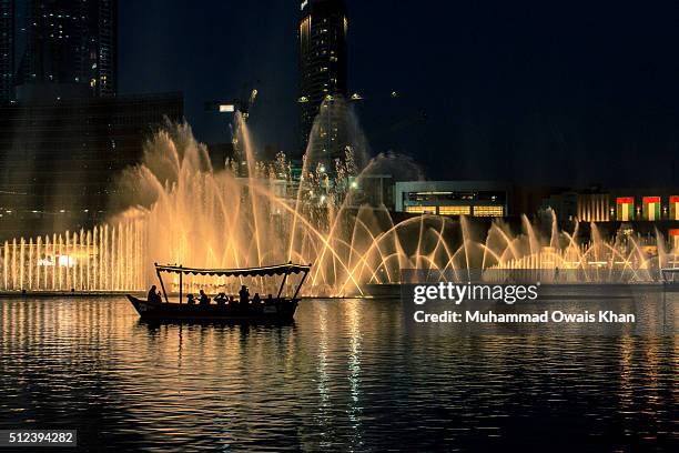 dubai fountain lake ride. dubai mall, dubai, uae. - dubai fountain stock pictures, royalty-free photos & images