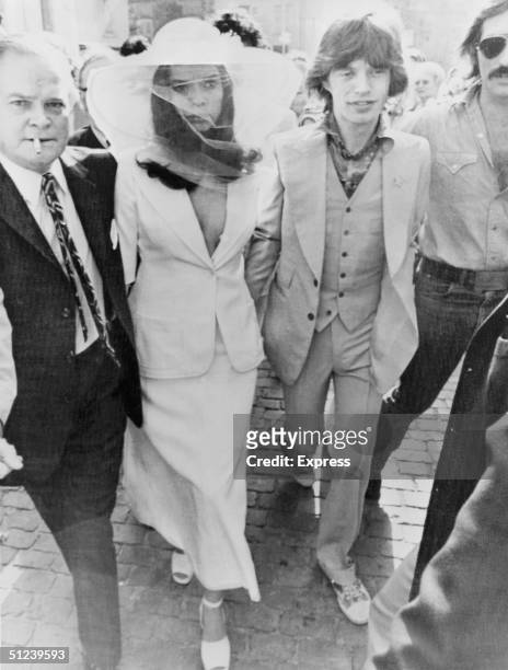 13th May 1971, British rock singer Mick Jagger and his new wife Bianca Jagger outside St Tropez Town Hall on their wedding day.
