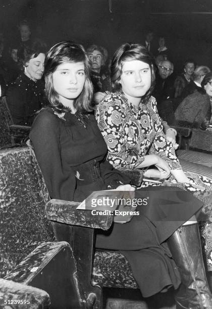 18th February 1971, Italian-born actor and model Isabella Rossellini and her twin sister, Isotta Ingrid Rossellini, in the audience of the play,...