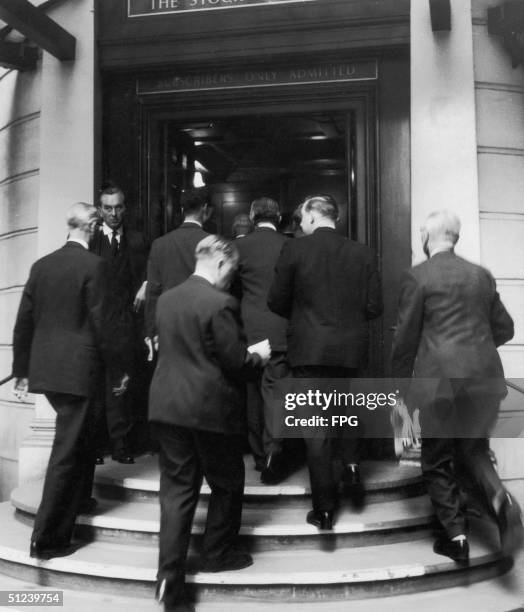 Brokers crowd the London Stock Exchange on the day that the Conservatives gained a majority in the election, adding millions of pounds to the...