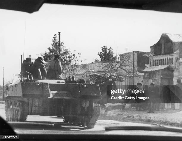 Soviet tank rolls through the countryside during Afghan Civil War, Afghanistan.