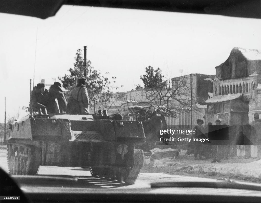 Soviet Command Tank Soviet tank rolls through the countryside during Afghan Civil War ...