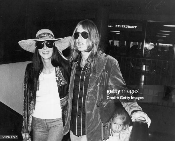 Circa 1976, American singer and actor Cher with her second husband rock singer and musician Gregg Allman and her daughter Chastity Bono.
