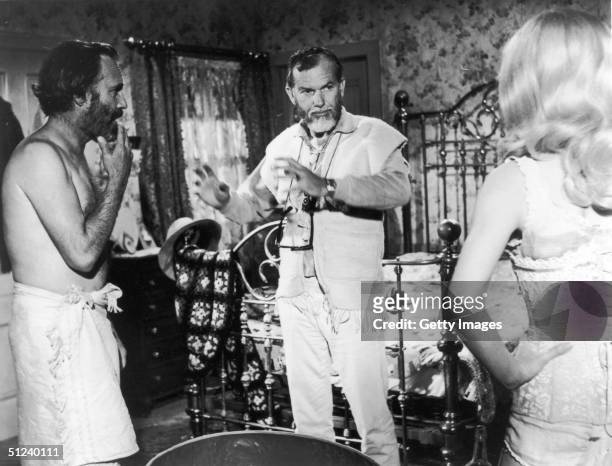 American actors Jason Robards ) and Stella Stevens with American director Sam Peckinpah on set of Peckinpah's film 'The Ballad of Cable Hogue'.