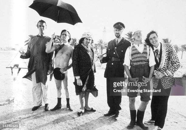All six members of the Monty Python team on location in Tunisia to film 'Monty Python's Life of Brian'. From left to right they are John Cleese,...