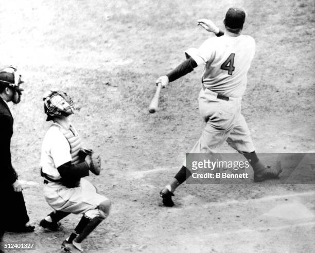 Catcher Ernie Lombardi of the Cincinnati Reds fouls the ball off as catcher Birdie Tebbetts of the Detroit Tigers tracks the ball during Game 3 of...