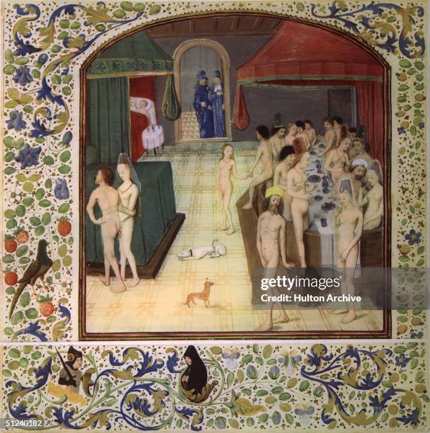 Circa 1450, A group of naked men and women cavort in a bath across which is laid a table with food and wine. Couples wander off together or lie in...