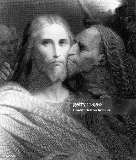 Circa 30 AD, Jesus Christ being kissed by Judas Iscariot, the apostle who betrayed him.