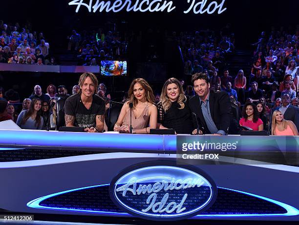 Judges Keith Urban, Jennifer Lopez, guest judge and Season 1 winner Kelly Clarkson and judge Harry Connick Jr. Onstage at FOX's American Idol Season...