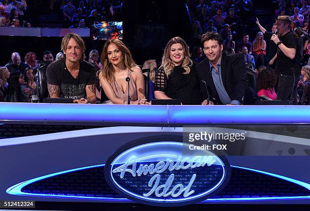 Judges Keith Urban, Jennifer Lopez, guest judge and Season 1 winner Kelly Clarkson and judge Harry Connick Jr. Onstage at FOX's American Idol Season...