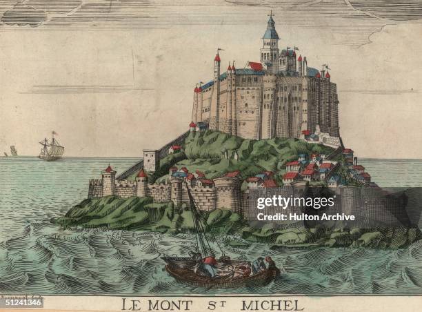 The medieval stronghold of Mont Saint Michel in Normandy, France, dominated by the abbey church. The islet was once cut off from the mainland at high...
